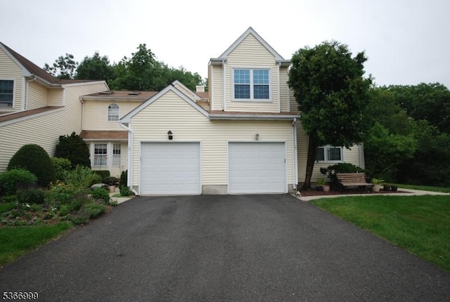 25 Watchung Trl, Branchburg Twp, NJ 08876 - view of front of home with driveway and an attached garage