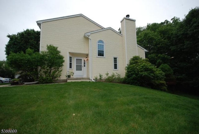 25 Watchung Trl, Branchburg Twp, NJ 08876 - view of front of property featuring a front yard and a chimney
