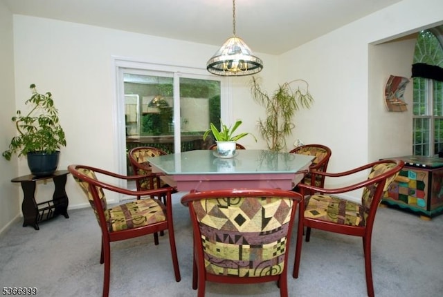 25 Watchung Trl, Branchburg Twp, NJ 08876 - carpeted dining space with a chandelier and baseboards