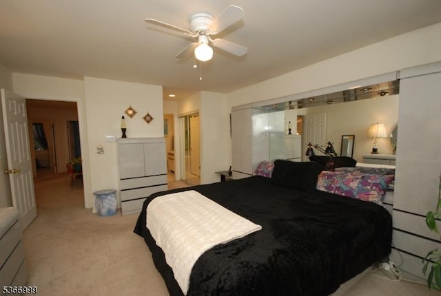 25 Watchung Trl, Branchburg Twp, NJ 08876 - bedroom with light colored carpet, a closet, and a ceiling fan