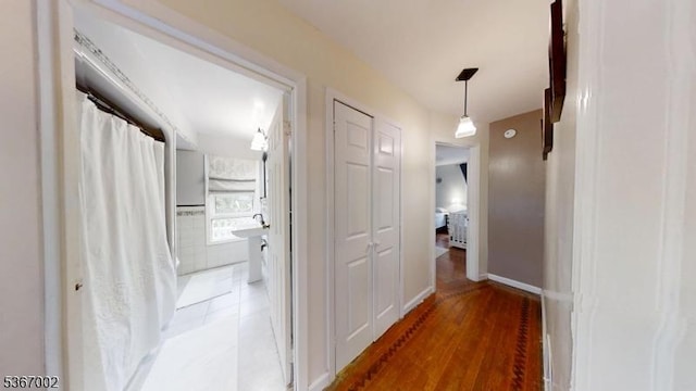 979 Lorraine Ave, Union Twp, NJ 07083 - hallway featuring light wood finished floors and baseboards