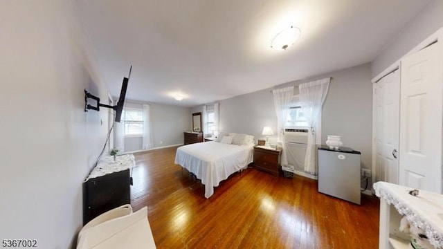 979 Lorraine Ave, Union Twp, NJ 07083 - bedroom with fridge and dark wood-type flooring