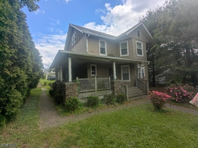 43 Main St, Hampton Boro, NJ 08827 - view of front of home featuring covered porch and a front lawn