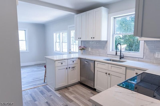 4 Bear Pond Trl, Hopatcong Boro, NJ 07821 - kitchen with stainless steel dishwasher, a peninsula, backsplash, light wood-style flooring, and white cabinetry