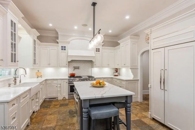 1 Bates Way, Westfield Town, NJ 07090 - kitchen with premium appliances, stone tile floors, decorative backsplash, white cabinetry, and crown molding