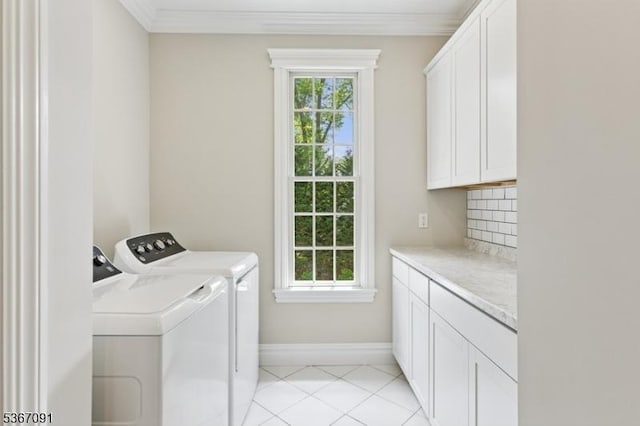 1 Bates Way, Westfield Town, NJ 07090 - laundry area with cabinet space, washing machine and clothes dryer, light tile patterned floors, and ornamental molding
