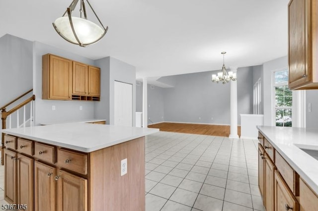 3 Whisper Way, Barnegat Twp, NJ 08005 - kitchen featuring light tile patterned floors, light countertops, pendant lighting, and a chandelier