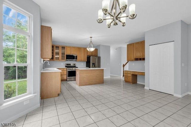 3 Whisper Way, Barnegat Twp, NJ 08005 - kitchen with stainless steel appliances, a chandelier, plenty of natural light, and light tile patterned floors