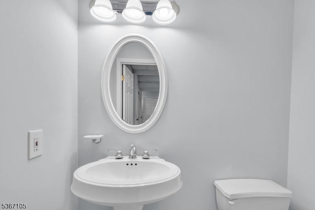 3 Whisper Way, Barnegat Twp, NJ 08005 - bathroom featuring a sink and a chandelier