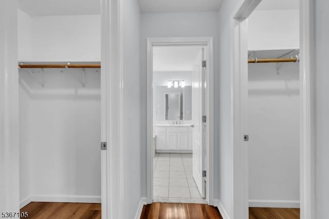 3 Whisper Way, Barnegat Twp, NJ 08005 - walk in closet with wood finished floors and a sink