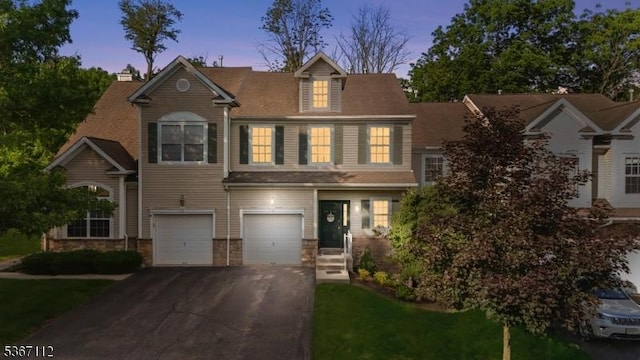 73 Pinehurst Dr, Washington Twp, NJ 07882 - view of front of property with driveway, an attached garage, and a yard