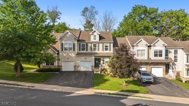 73 Pinehurst Dr, Washington Twp, NJ 07882 - multi unit property featuring driveway, an attached garage, and a front lawn