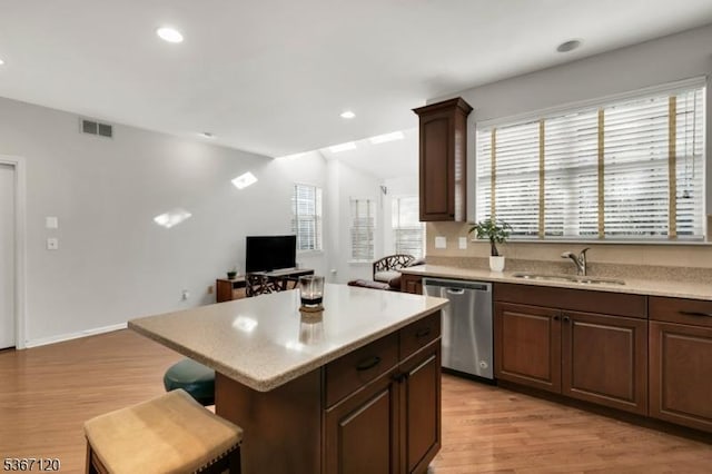 51 Carlisle Rd, Bernards Twp, NJ 07920 - kitchen with dishwasher, light countertops, light wood finished floors, a kitchen island, and recessed lighting