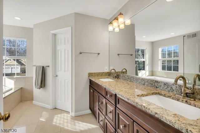 51 Carlisle Rd, Bernards Twp, NJ 07920 - full bath with double vanity, a garden tub, tile patterned floors, and recessed lighting