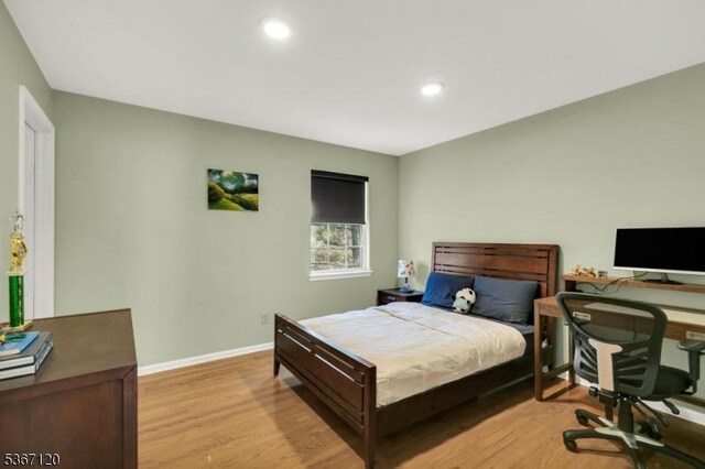 51 Carlisle Rd, Bernards Twp, NJ 07920 - bedroom featuring light wood-style floors, an office area, and recessed lighting