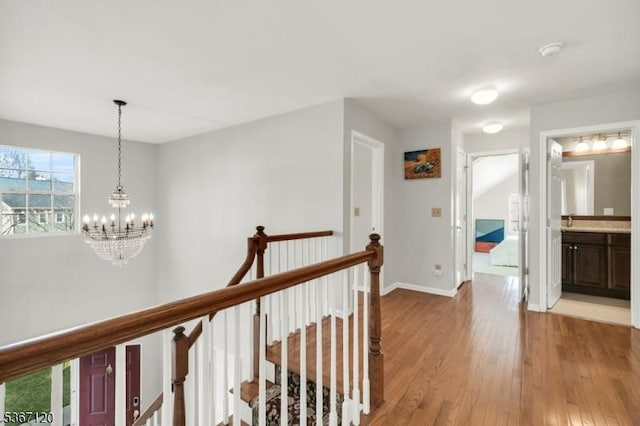 51 Carlisle Rd, Bernards Twp, NJ 07920 - hall with an upstairs landing, light wood-style floors, and a chandelier