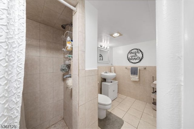 1697 Van Ness Ter, Union Twp, NJ 07083 - full bath with a tile shower, tile walls, a wainscoted wall, vanity, and tile patterned flooring