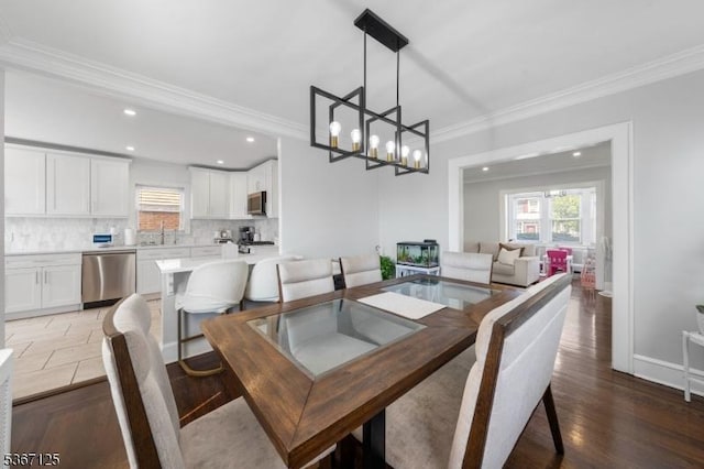1697 Van Ness Ter, Union Twp, NJ 07083 - dining room with ornamental molding, a chandelier, recessed lighting, and light wood finished floors