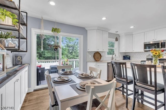 32 Mountain Heights Dr, Byram Twp, NJ 07871 - dining space featuring light wood-type flooring and recessed lighting