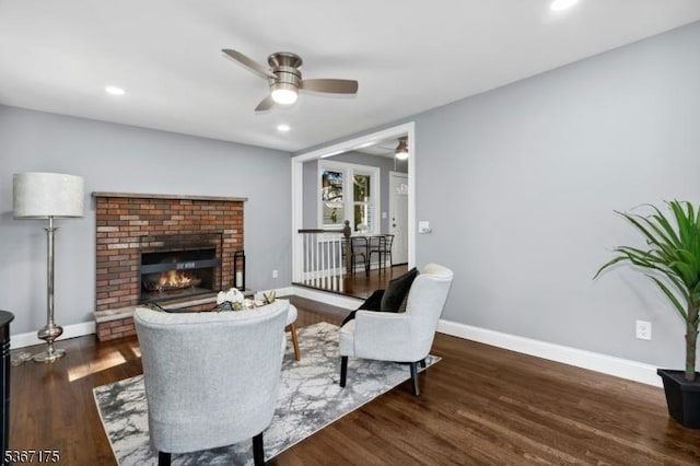 945 Wendy Ct, Union Twp, NJ 07083 - living room with ceiling fan, a brick fireplace, wood finished floors, and recessed lighting