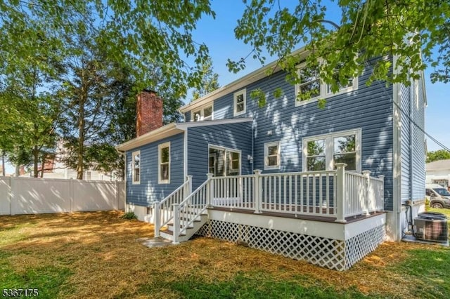 945 Wendy Ct, Union Twp, NJ 07083 - back of property with a chimney and a deck