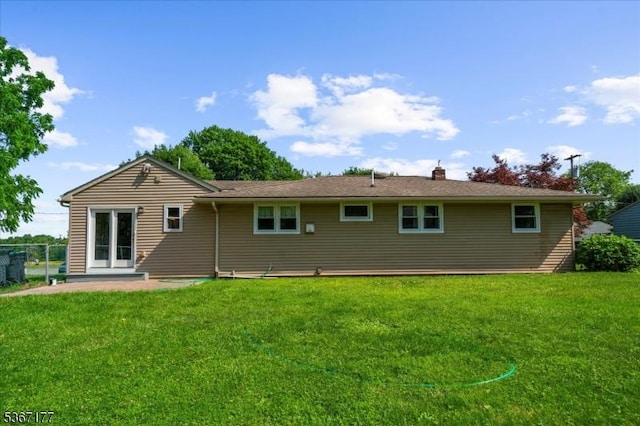 129 Francis St, Pohatcong Twp, NJ 08865 - back of property with a chimney and a patio area
