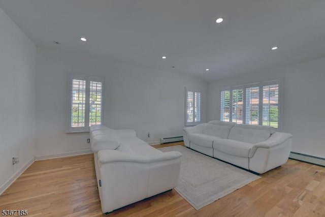 55 Florence St, Nutley Twp, NJ 07110 - living area with healthy amount of natural light, light wood-style flooring, and recessed lighting