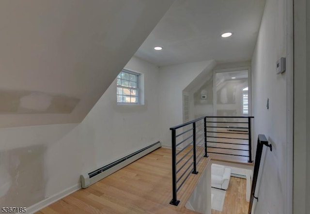 55 Florence St, Nutley Twp, NJ 07110 - stairs with a baseboard heating unit, wood finished floors, and recessed lighting