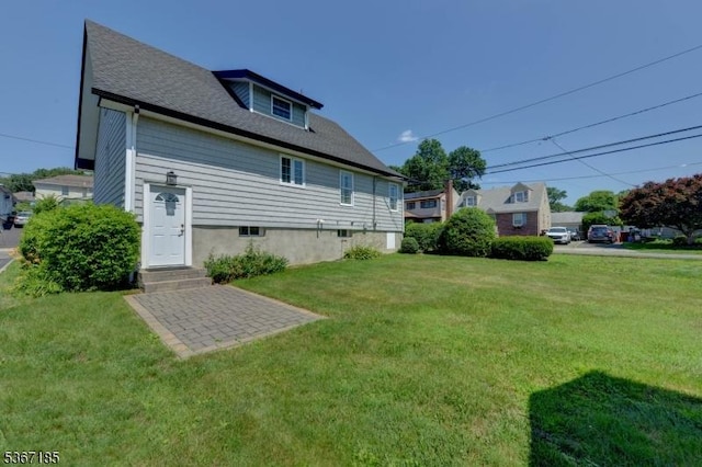 55 Florence St, Nutley Twp, NJ 07110 - back of house with a yard and a shingled roof