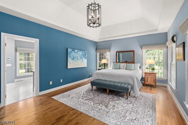 5 Mcvickers Ln, Mendham Twp, NJ 07945 - bedroom featuring a chandelier, wood finished floors, and a raised ceiling
