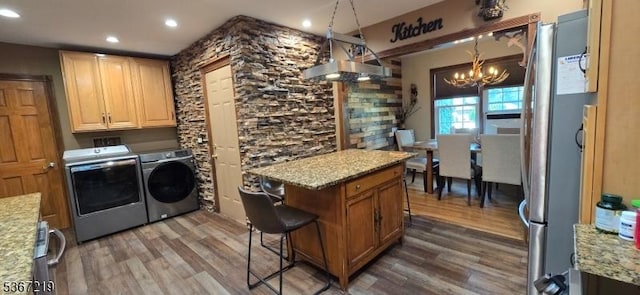 301 Ohio Ave, Pohatcong Twp, NJ 08865 - laundry room featuring independent washer and dryer, wood finished floors, a chandelier, and recessed lighting