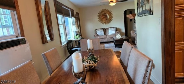 301 Ohio Ave, Pohatcong Twp, NJ 08865 - dining area featuring arched walkways, a ceiling fan, and radiator heating unit
