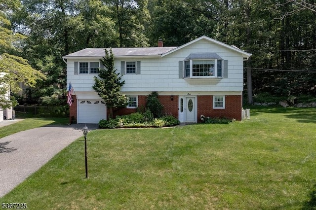 1 Lackawanna Trl, Hopatcong Boro, NJ 07843 - colonial inspired home with driveway, an attached garage, a front yard, and brick siding