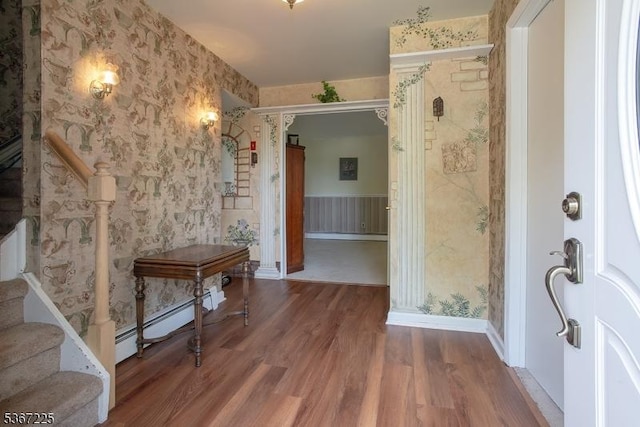 1 Lackawanna Trl, Hopatcong Boro, NJ 07843 - entryway featuring wallpapered walls, stairs, wood finished floors, and a baseboard heating unit