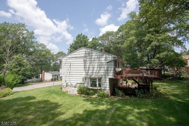 1 Lackawanna Trl, Hopatcong Boro, NJ 07843 - view of side of home featuring a deck, a lawn, and a chimney