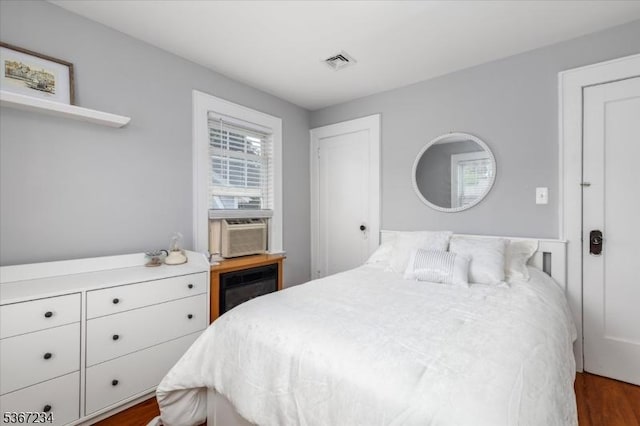 188 Wheaton Pl, Rutherford Boro, NJ 07070 - bedroom with dark wood-style floors and cooling unit