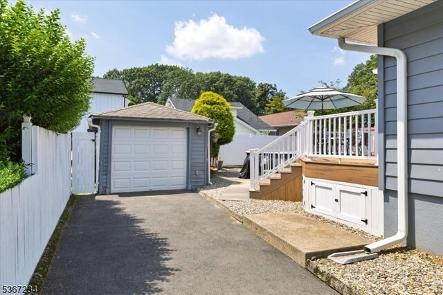 188 Wheaton Pl, Rutherford Boro, NJ 07070 - view of side of home with driveway, an outbuilding, a garage, and stairway