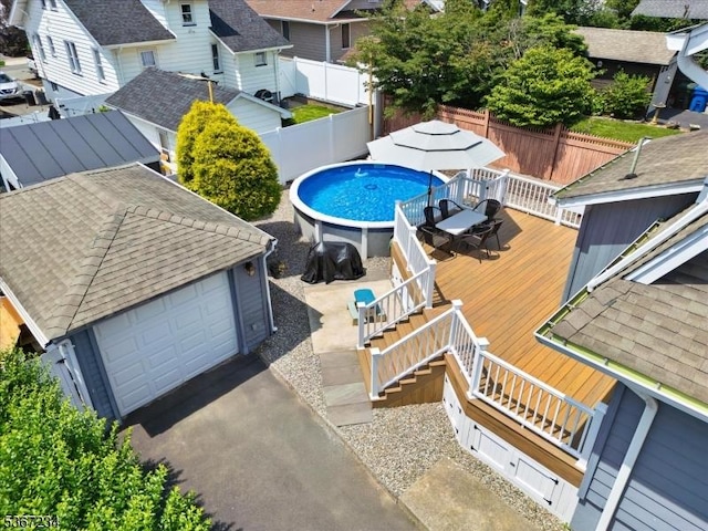 188 Wheaton Pl, Rutherford Boro, NJ 07070 - view of pool featuring a wooden deck, a fenced backyard, outdoor dining space, and a residential view