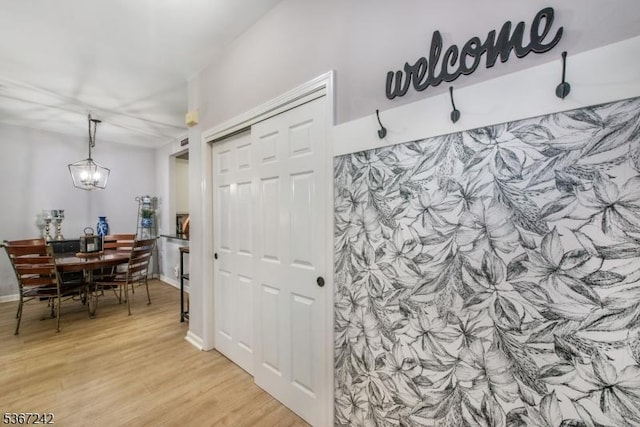 372 Cambridge Dr Unit 372, Butler Boro, NJ 07405 - entrance foyer with light wood-style floors and a chandelier