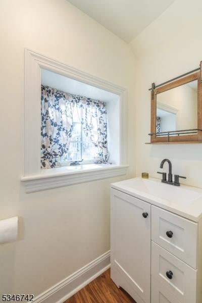 28 Middle Valley Rd, Washington Twp, NJ 07853 - bathroom with vanity and wood finished floors