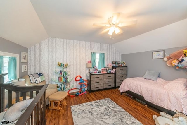 28 Middle Valley Rd, Washington Twp, NJ 07853 - bedroom with vaulted ceiling, wood finished floors, wallpapered walls, and ceiling fan