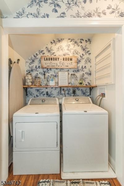 28 Middle Valley Rd, Washington Twp, NJ 07853 - washroom featuring independent washer and dryer, wallpapered walls, and light wood-type flooring