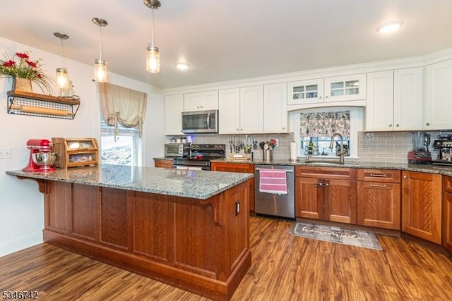 28 Middle Valley Rd, Washington Twp, NJ 07853 - kitchen with stainless steel appliances, dark wood finished floors, white cabinets, and backsplash