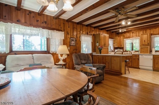 2 Hazelnut Dr, Hampton Twp, NJ 07860 - dining room featuring beam ceiling, wooden walls, a ceiling fan, a chandelier, and light wood-style flooring