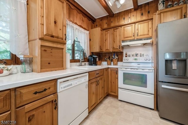 2 Hazelnut Dr, Hampton Twp, NJ 07860 - kitchen with white appliances, under cabinet range hood, healthy amount of natural light, and light countertops