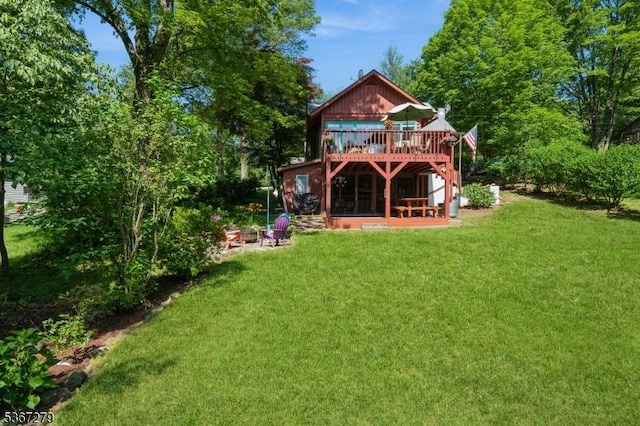 2 Hazelnut Dr, Hampton Twp, NJ 07860 - back of house featuring a deck and a yard