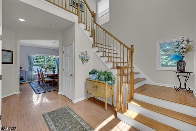 6 Bowers Dr, Allamuchy Twp, NJ 07840 - stairway with wood finished floors and a towering ceiling