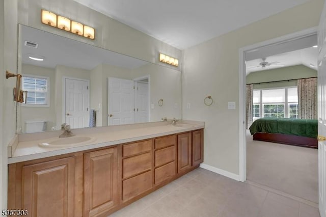 6 Bowers Dr, Allamuchy Twp, NJ 07840 - ensuite bathroom featuring double vanity, tile patterned floors, and a ceiling fan