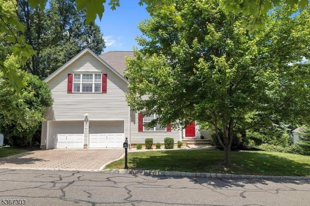 6 Bowers Dr, Allamuchy Twp, NJ 07840 - view of front of property with a garage, decorative driveway, and a front yard