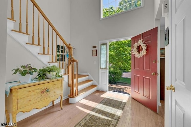 6 Bowers Dr, Allamuchy Twp, NJ 07840 - foyer with a towering ceiling, stairs, and hardwood / wood-style floors